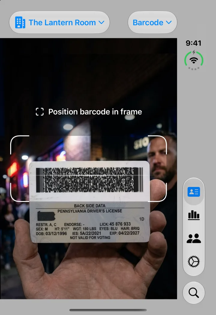 Check ID on iPhone Duo’s outer display, scanning the barcode on the back of a driver’s license.